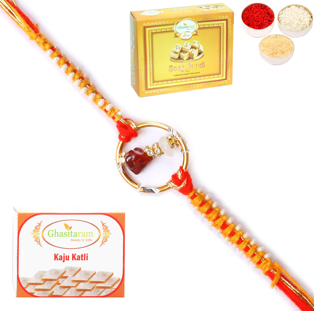 Rakhi for Brother Rakhis Online - 8487 Premium Rakhi with 200 gms of Kaju katli and 200 gms of Soan Papdi 