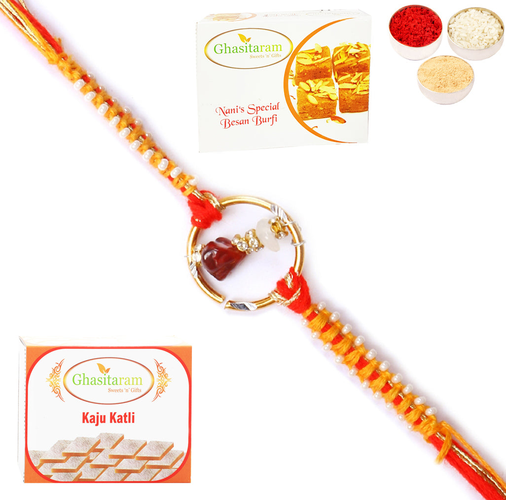 Rakhi for Brother Rakhis Online - 8487 Premium Rakhi with 200 gms of Besan Barfi and 200 gms of Kaju Katli