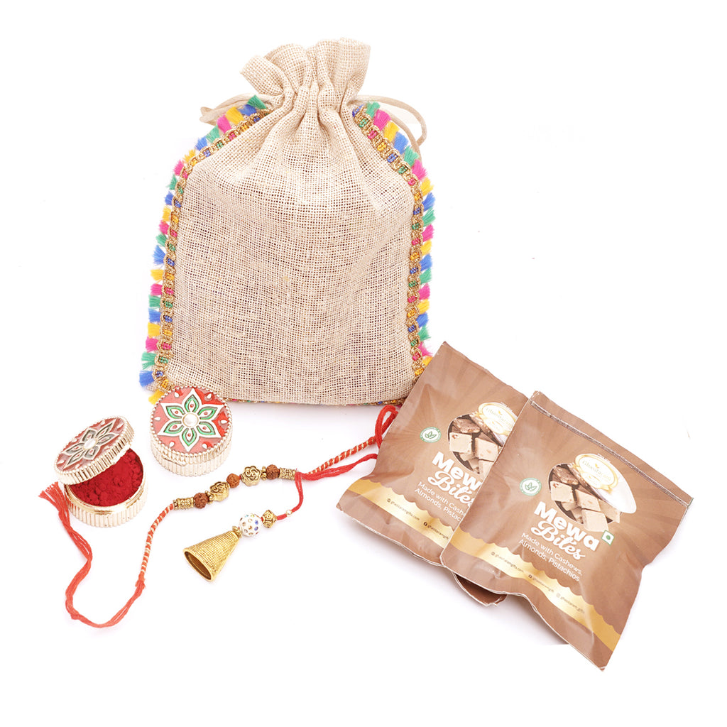 Rakhi Gift Bag of Pooja Thali and 2 pcs Om Rakhi to Guwahati, India