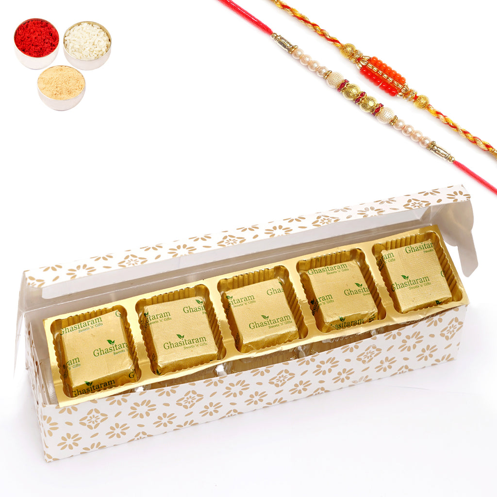 Rakhi Gifts-White printed 5 bites box with mewa bites with 2 Rakhis